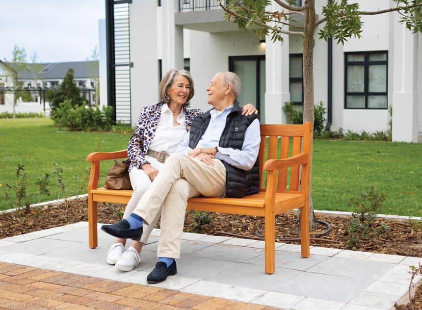 A couple on a garden bench