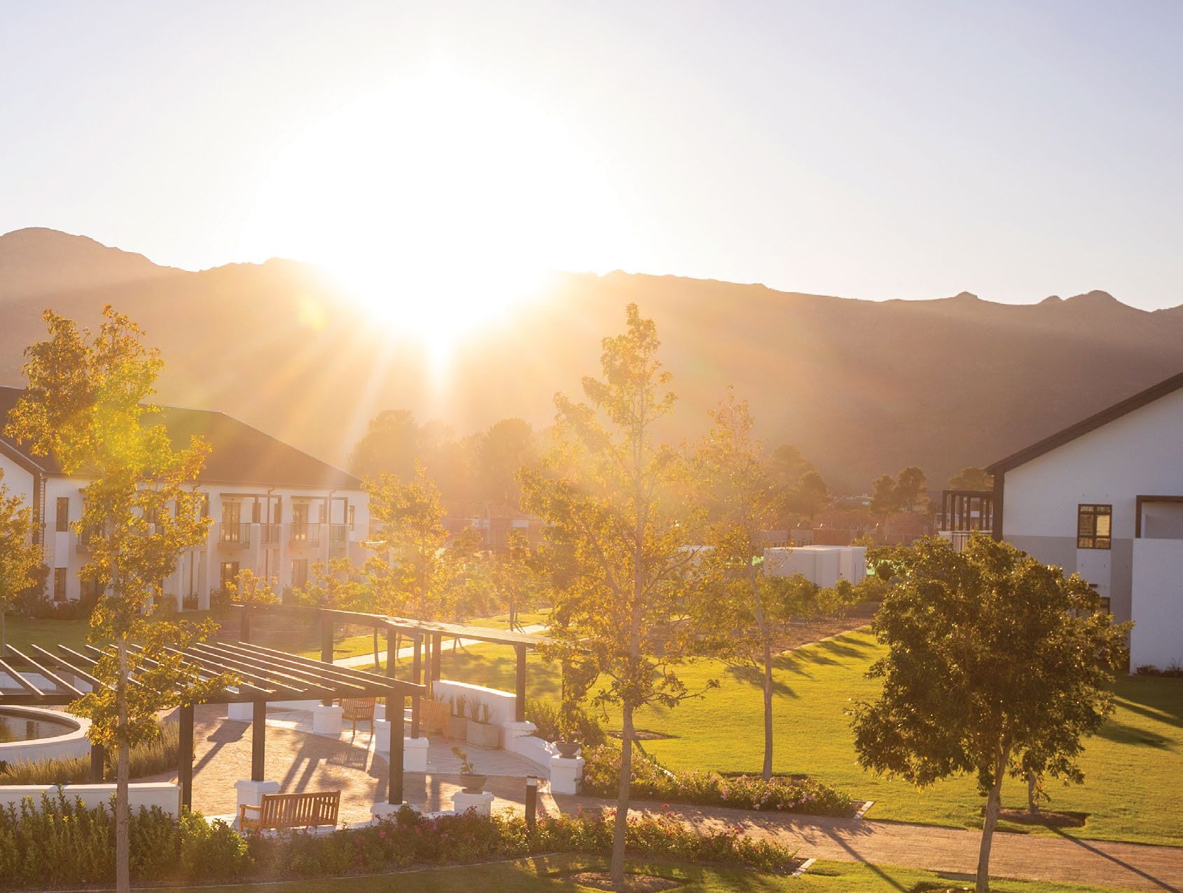 Val de Vie Evergreen at sunset, with the mountains behind